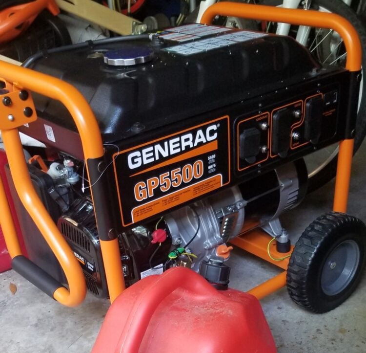 image: orange portable generator with red gas can