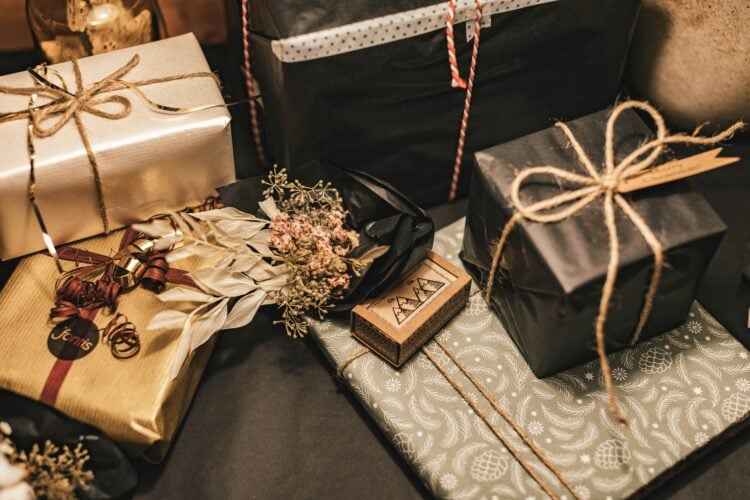 assortment of gold and brown wrapped gifts