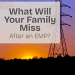 large electricity tower against sunset