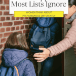 woman guiding young girl into brick building